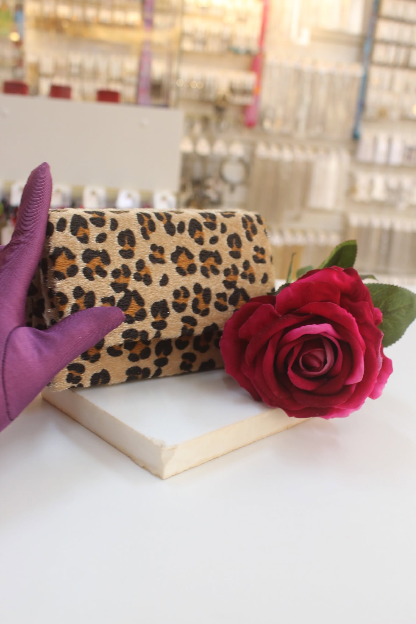 Clutch de festa estampa de onça