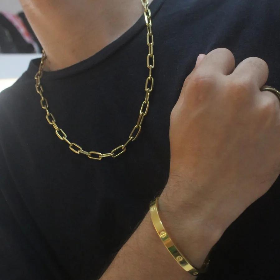 Corrente elo cartier dourada com pulseira rígida dourada
