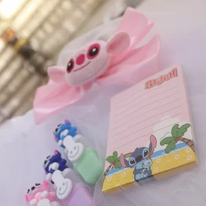 Laço Stitch Angel com caderneta e borrachinhas coloridas